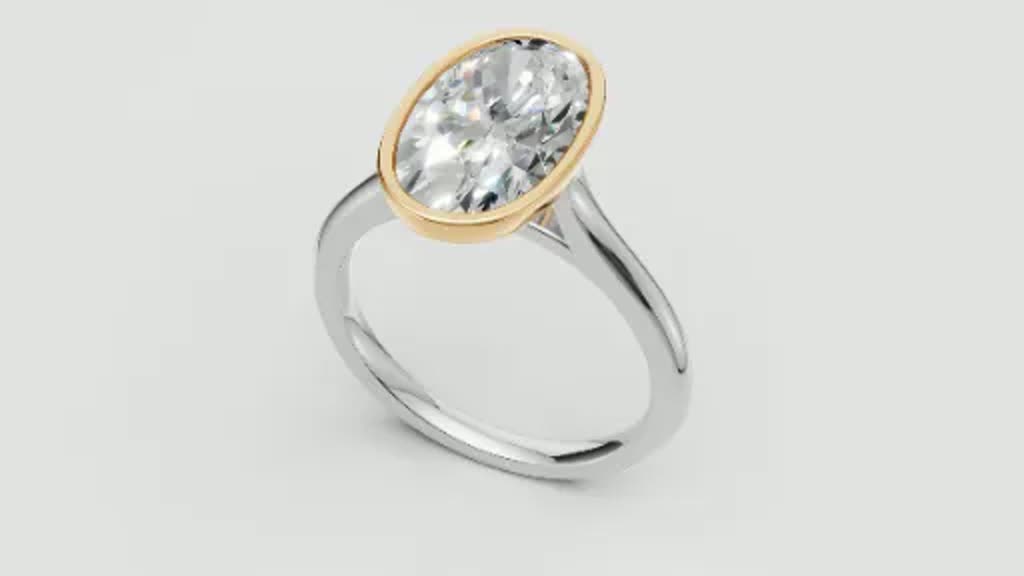 Oval bezel ring, designed and made by Andrews Jewelers